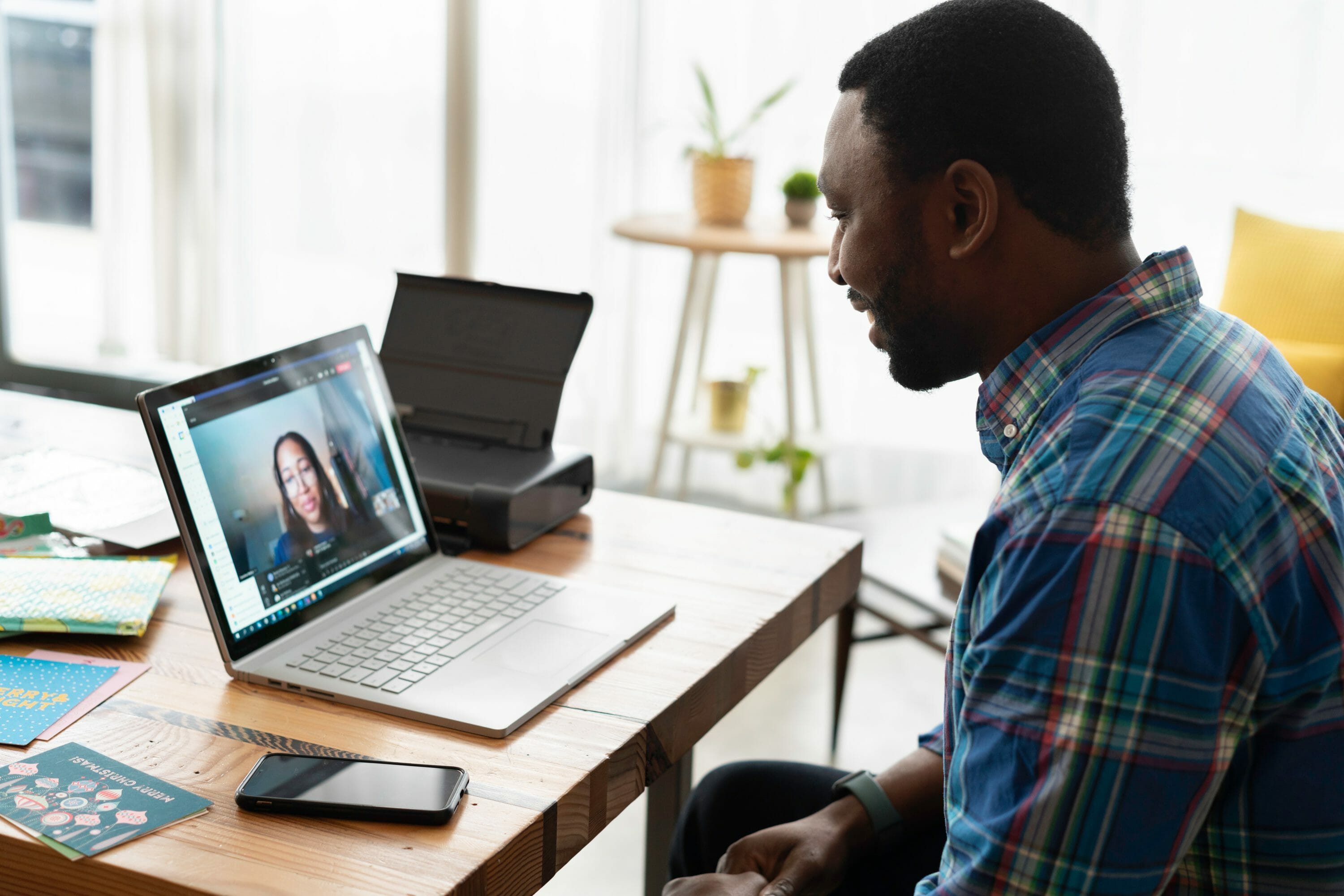 agency owner on a zoom meeting with a team member