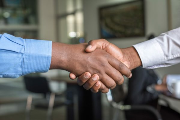 a handshake deal buying an agency